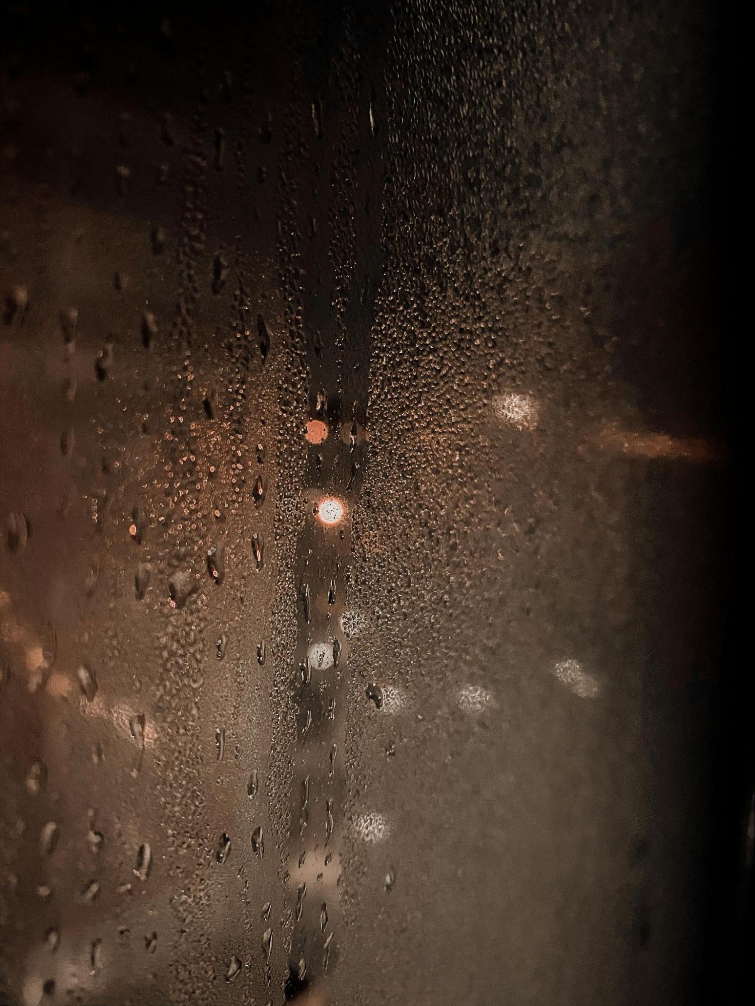Raindrop on Frosted Window
