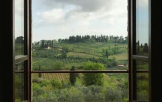 View of the Tuscan Countryside through a Window