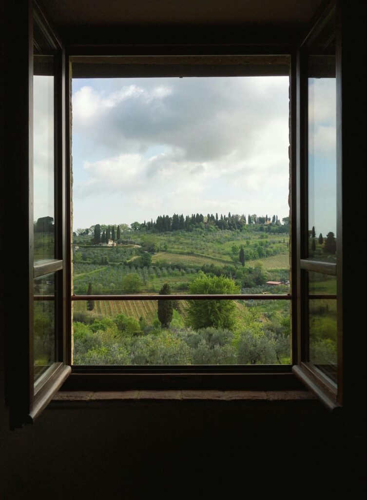 View of the Tuscan Countryside through a Window