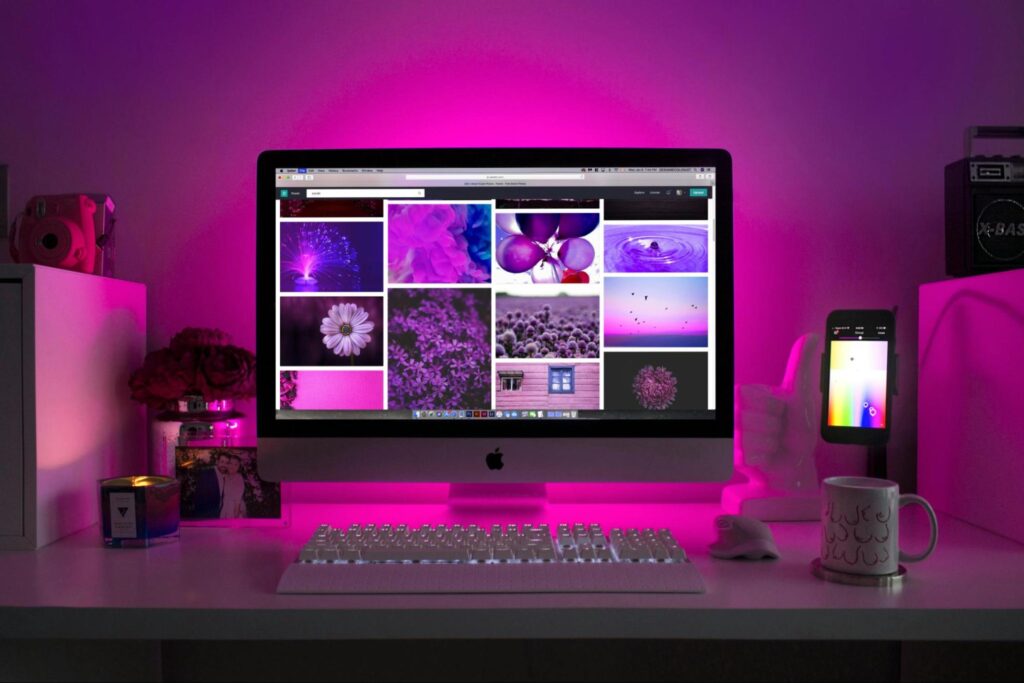 Computer Screen in a Purple-Lit Room