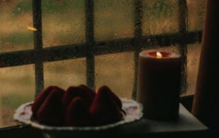 Frosted Window with Fruit and Candle