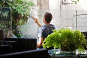 Man Cleaning Interior Windows