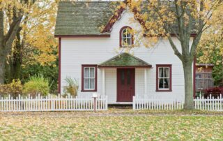 Exterior of a White Home with Picket Fence