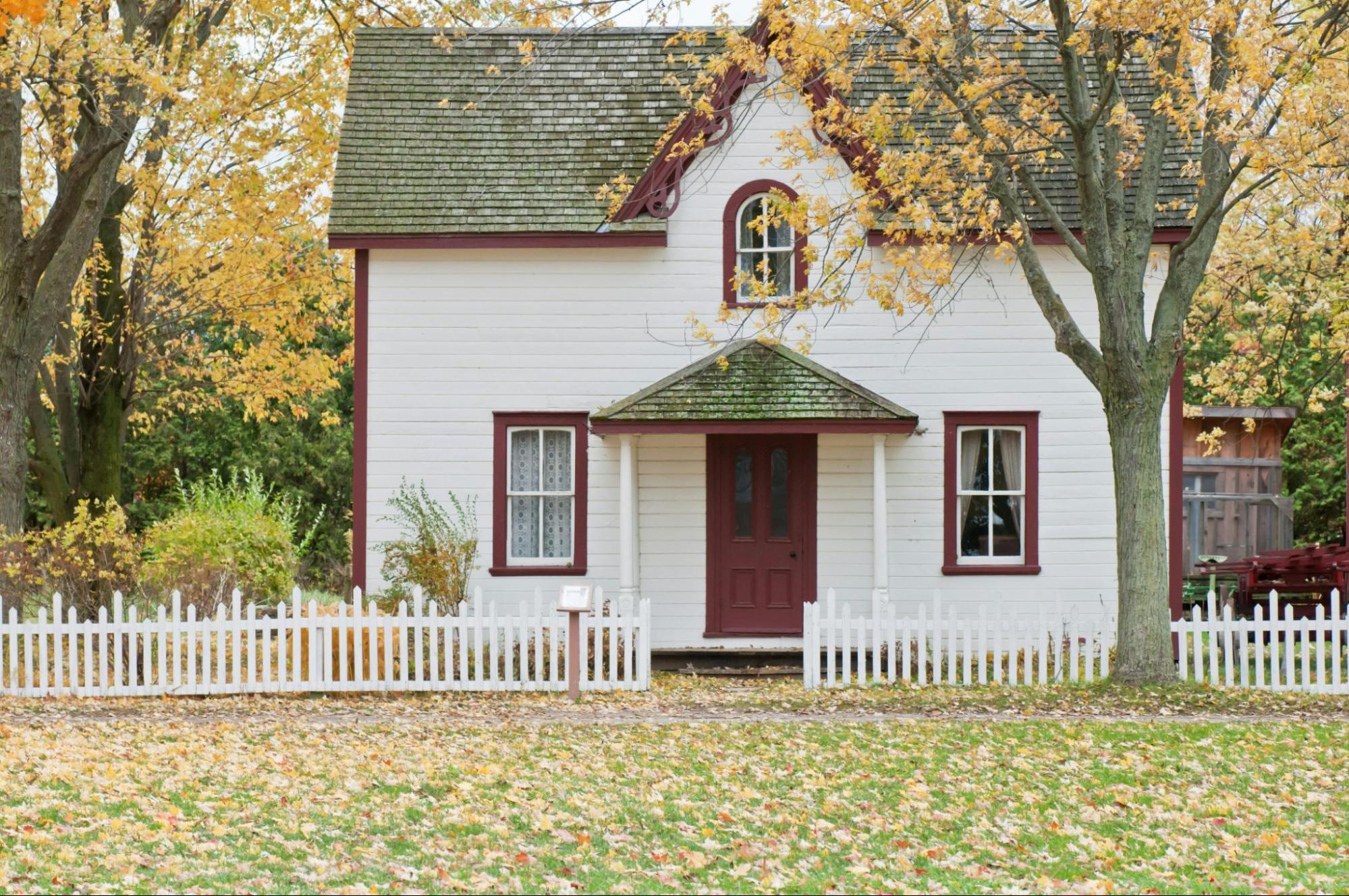 Exterior of a White Home with Picket Fence